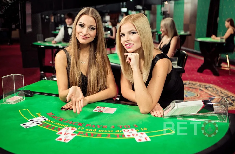 Tampilan ruang kasino live dengan meja dealer dan antarmuka permainan DOLANTOGEL